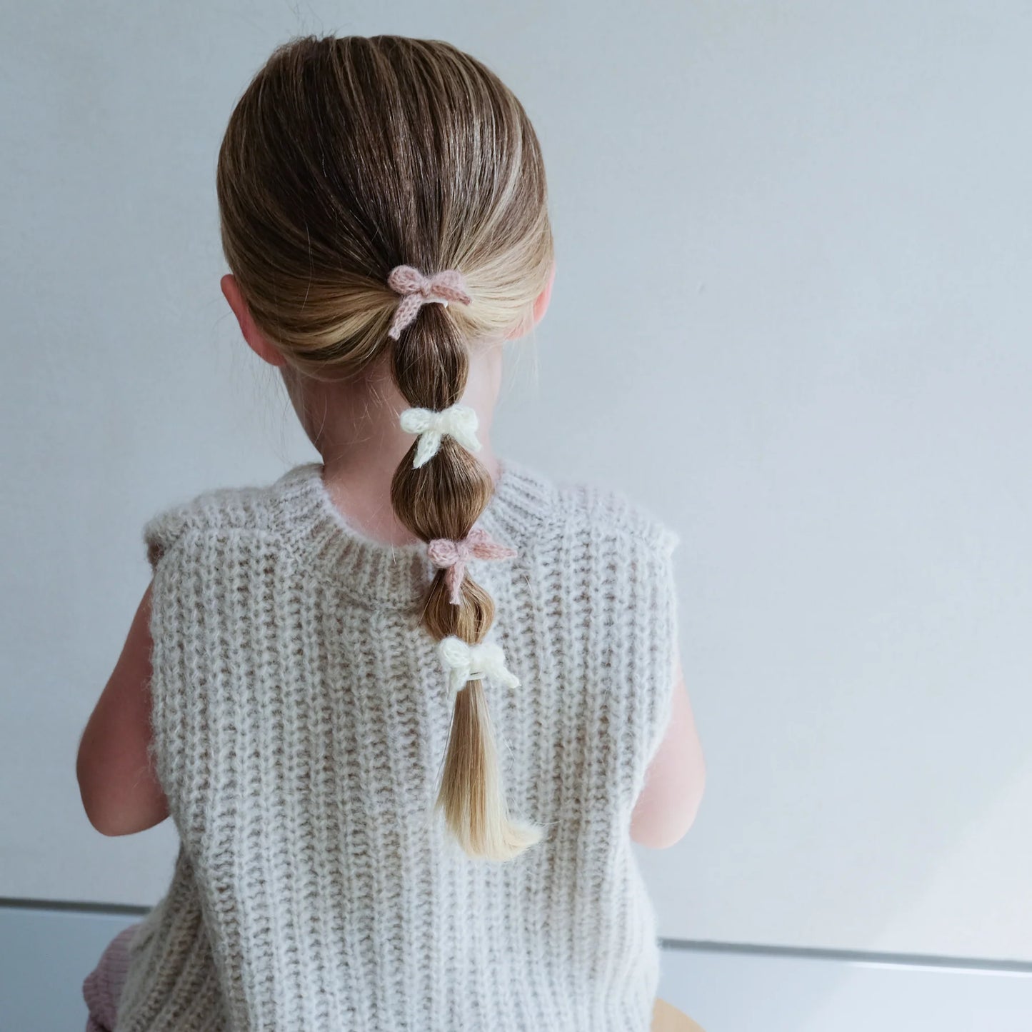 Granny knitted bow mini ponies