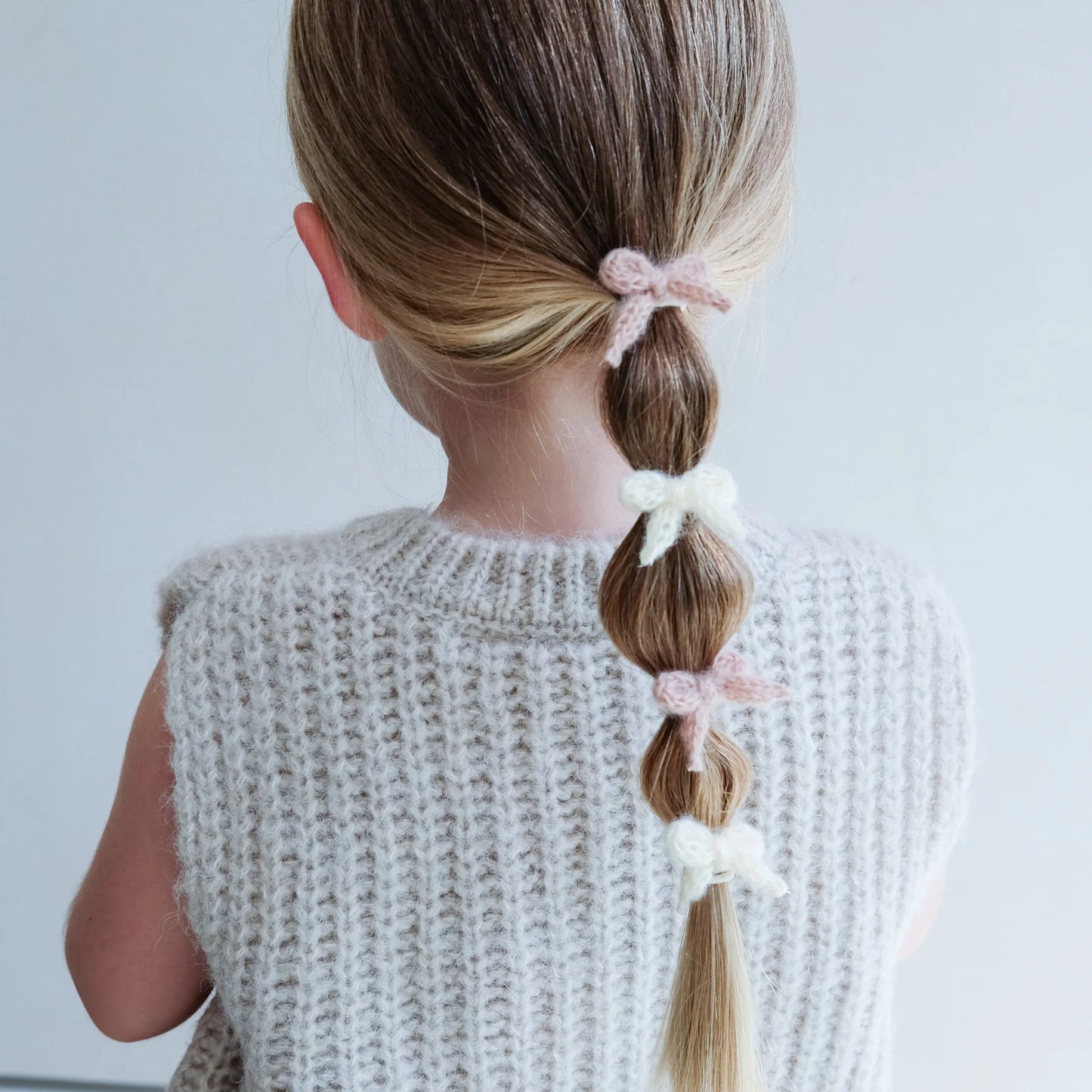Granny knitted bow mini ponies